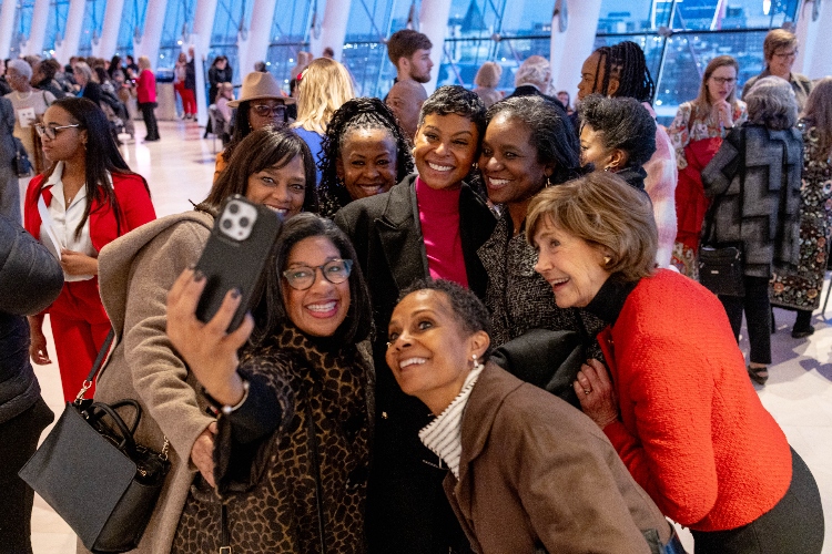 Attendees take a selfie 